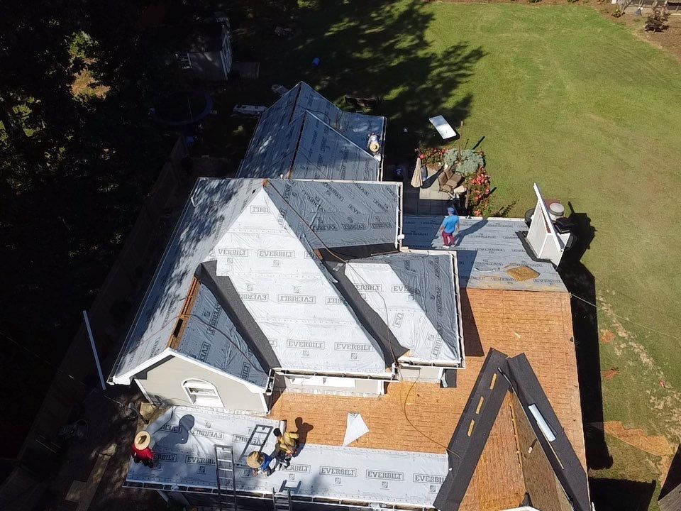Aerial view — roof underlayment on brick residential property