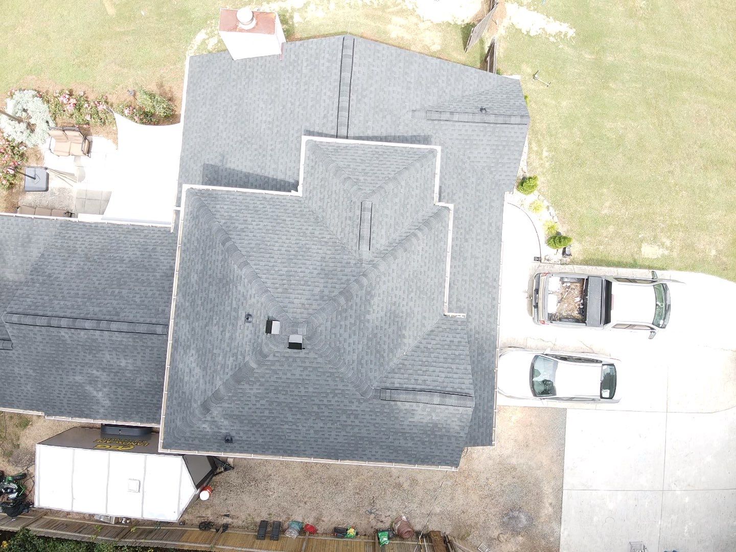 Completed shingle roof — aerial top-down view